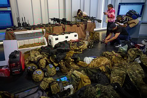 Weapons that were recovered by Cuban authorities from a speedboat in Cuban waters following a confrontation that left four people dead are displayed during a media presentation in Havana, Friday, Feb. 27, 2026.