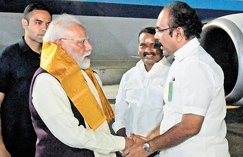 Tamil Nadu Finance Minister Thangam Thennarasu welcoming Prime Minister Narendra Modi at the Chennai International Airport on Saturday 