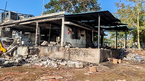 An excavator clears the debris after a blast at an explosives manufacturing factory, in Nagpur district, Sunday, Mar. 1, 2026. At least 15 persons were killed in the explosion at the SBL Energy Limited facility, according to police. 