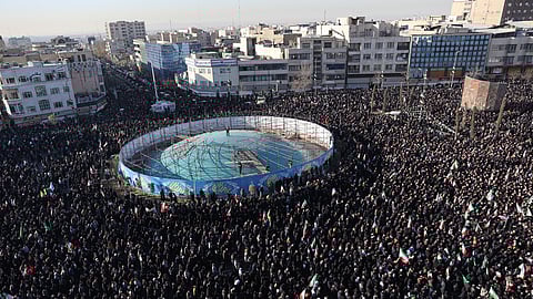 Government supporters gather in mourning after state TV officially announced the death of Iranian Supreme Leader Ayatollah Ali Khamenei in Tehran, Iran, Sunday, March 1, 2026.