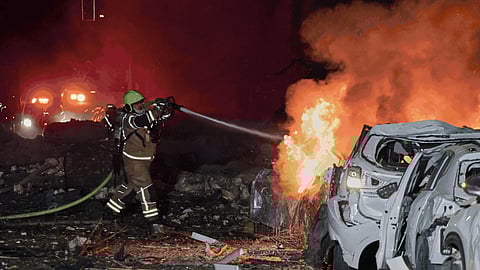 Missiles, sirens and smoke: Scenes from Israel and Iran after nationwide alerts and retaliatory strikes.