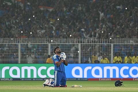 Sanju Samson looks up to the sky as he celebrates after scoring the winning runs for India on Sunday