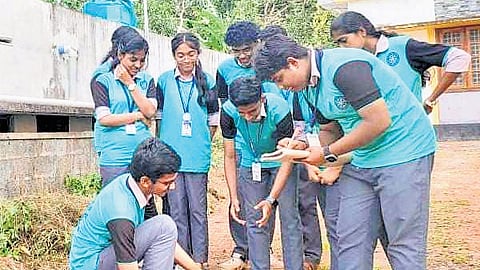 NSS volunteers testing the soil PH within the municipal jurisdiction