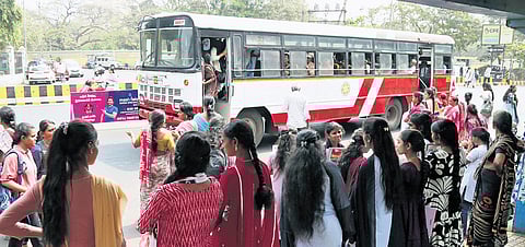 Women wait to board RTC buses in Vizakhapatnam to avail free travel facility 