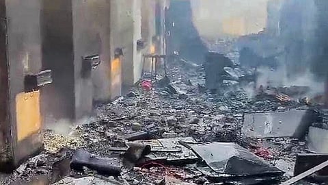 Debris and damaged structures seen after a blast at an explosives manufacturing factory, in Nagpur district, Sunday, Mar. 1, 2026. At least 15 persons were killed in the explosion at the SBL Energy Limited facility, according to police.