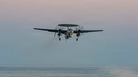 This image provided by US Central Command shows an E-2D Hawkeye preparing to land on the USS Abraham Lincoln (CVN 72) in support of Operation Epic Fury on Saturday, Feb. 28, 2026.