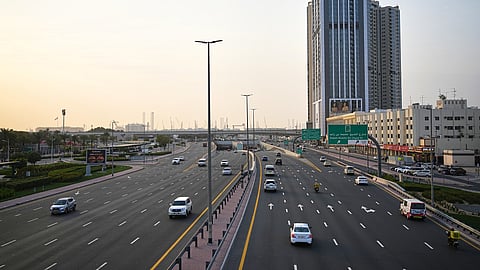 Light traffic moves along a main road in Dubai, United Arab Emirates, Tuesday, March 3, 2026.