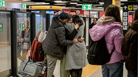 Italy-bound passengers who took a flight from Abu Dhabi arrive at Fiumicino Airport, in Rome, on Tuesday, March 3, 2026.