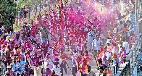 Members of the Sikh community  perform Halla Bol as part of a procession in Hyderabad on Wednesday 