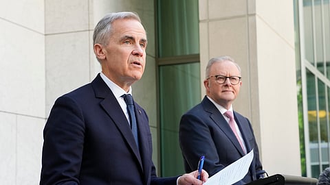 Canada's Prime Minister Mark Carney, left, and Australian Prime Minister Anthony Albanese participate in a joint news conference, in Canberra, Australia, Thursday, March 5, 2026. 