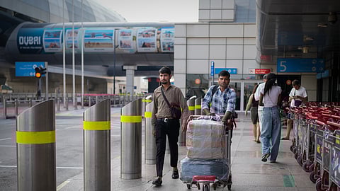 Passengers arrive at Dubai International Airport terminal as the airport resumes limited operations in Dubai, United Arab Emirates, Thursday, March 5, 2026. 