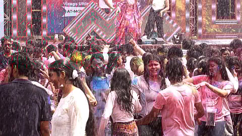 People celebrating Holi in Visakhapatnam on Wednesday.