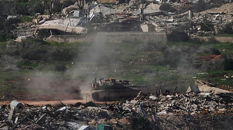 An Israeli tank maneuvers in southern Lebanon is seen from northern Israel, Thursday, March 5, 2026.