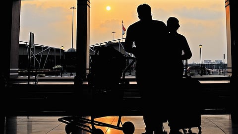Gulf returnees at the Kochi airport on Wednesday.
