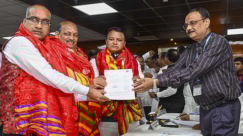 BJP candidates Manmohan Samal and Sujeet Kumar during filing of their nominations for the Rajya Sabha polls in the presence of Odisha Chief Minister Mohan Charan Majhi