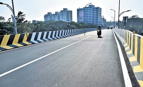 The flyover at the Madhya Kailash junction was closed to traffic to lay the new tarmacadam layer and was reopened on Thursday morning 