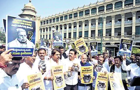 BJP legislators protest outside Vidhana Soudha after CM Siddaramaiah presented his record 17th budget on Friday 