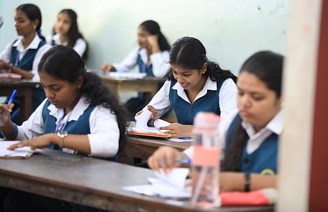 Students appear for the Plus two examination at Cottan Hill Higher Secondary School in Thiruvananthapuram. 