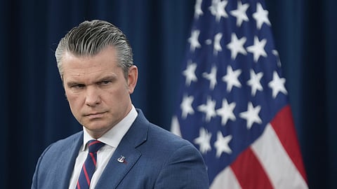 US Defense Secretary Pete Hegseth listens during a press briefing at the Pentagon, Monday, March 2, 2026, in Washington.