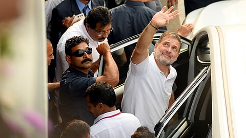The leader of opposition in the Lok Sabha, Rahul Gandhi,  waves to students as he leaves the campus after an interaction session at Marian College in Kuttikkanam on Friday.