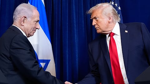 FILE - President Donald Trump shakes hands with Israel's Prime Minister Benjamin Netanyahu during a news conference at Mar-a-Lago, Dec. 29, 2025, in Palm Beach, Fla.