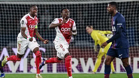 Monaco's Folarin Balogun (C) celebrates after scoring his team's third goal during the French L1 football match between PSG and AS Monaco at the Parc des Princes stadium in Paris on March 6, 2026.