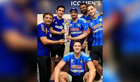 India head coach Gautam Gambhir (second from left), along with the support staff pose with the trophy after India won the T20 World Cup against New Zealand.