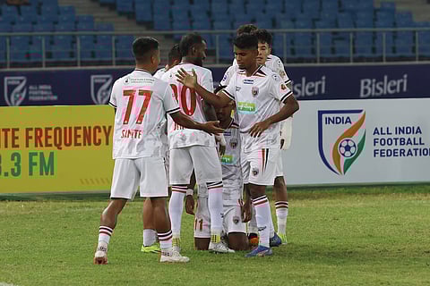 NorthEast United FC players celebrate a goal on Monday