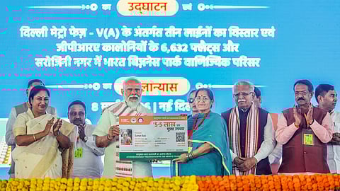  Prime Minister Narendra Modi with Union Minister of Housing and Urban Affairs Manohar Lal and Delhi CM Rekha Gupta during the inauguration and foundation stone laying ceremony of multiple development projects, New Delhi.