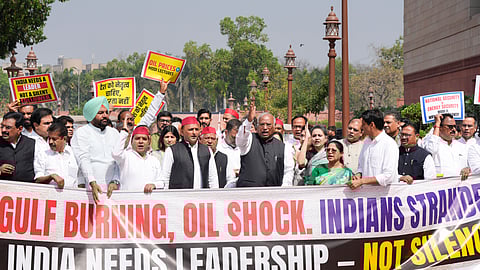 LoP in Rajya Sabha Mallikarjun Kharge, Samajwadi Party MP Akhilesh Yadav, LoP in Lok Sabha Rahul Gandhi and other opposition leaders stage a protest over the West Asia crisis with posters and banners reading, Gulf burning, oil shock.