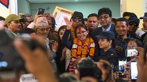 Supporters of Rastriya Swatantra Party celebrate the victory of Toshima Karki, a candidate for a seat in the House of Representatives in Lalitpur, Nepal, Saturday, March 7, 2026.