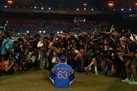 Suryakumar Yadav getting clicked with the trophy after the final