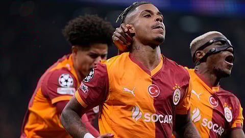 Galatasaray's Mario Lemina celebrates after scoring the opening goal during a Champions League round of 16 first leg soccer match between Galatasaray and Liverpool, in Istanbul, Turkey, Tuesday, March 10, 2026.