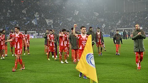 Bayern Munich players celebrate after winning the UEFA Champions League last 16, first leg football match between Atalanta and Bayern Munich at the Gewiss stadium in Bergamo, on March 10, 2026. 