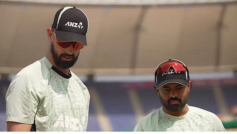 Saurabh Walkar with New Zealand all-rounder Daryl Mitchell