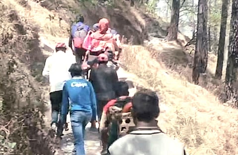 Himanti Devi, wife of Khadak Ram, needed urgent medical care. But with no motorable road to the village, fellow residents had to carry her on foot along treacherous mountain paths to the Primary Health Centre in Dewal.