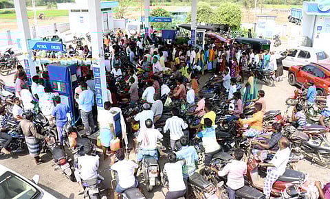 People queuing up at a petrol bunk. Image used for representational purposes only.