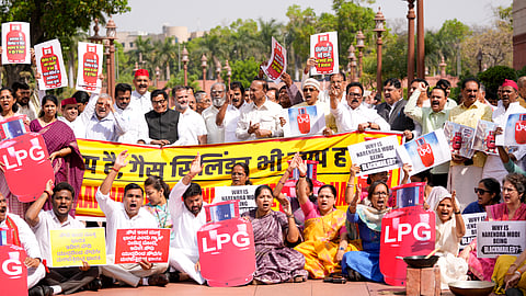Opposition MPs protest  demanding a discussion on the ongoing West Asia conflict and the shortage of LPG cylinders in several parts of the country.