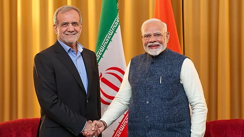 Prime Minister Narendra Modi with Iranian President Masoud Pezeshkian (L).