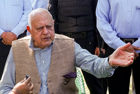 Security personnel deployed outside the residence of National Conference president Farooq Abdullah after a gunman fired a shot targeting him and J&K Dy CM Surinder Choudhary at a wedding function on Wednesday, in Jammu, Thursday, March 12, 2026. 