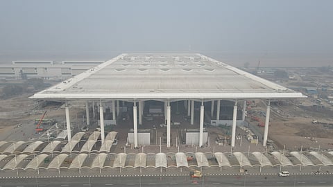 Facade of the passenger terminal at Noida International Airport.
