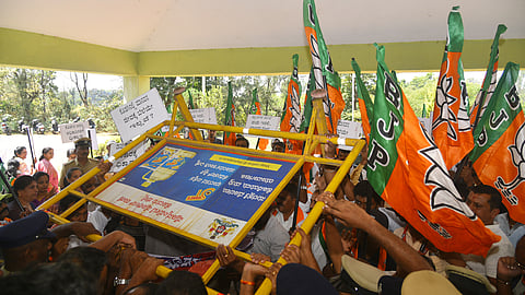  BJP workers lay siege to the forest department office in Madikeri. 