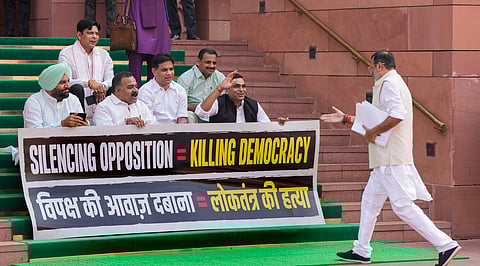 Congress MPs Hibi Eden, Prashant Padole and others at a protest during the second part of the Budget Session of Parliament, in New Delhi, Monday, March 9, 2026.
