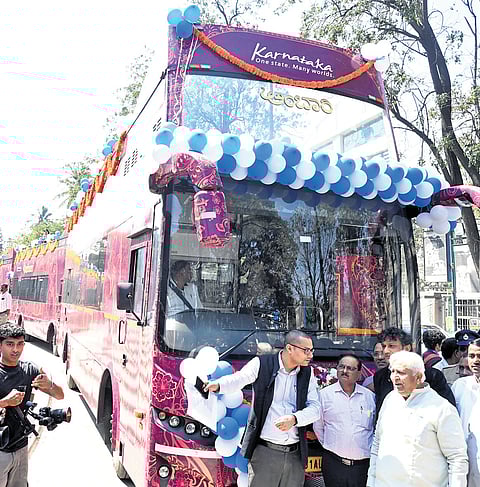 Tourism Minister HK Patil flags off double-decker buses as part of KSTDCs Ambaari hop on hop off services in Bengaluru recently.