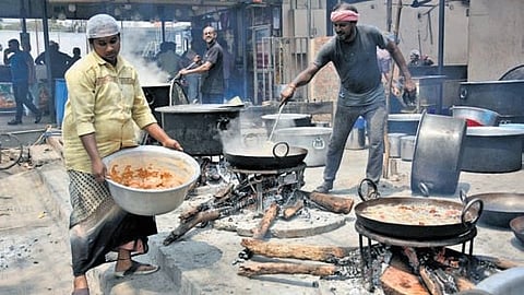 A restaurant using firewood to prepare food; People visit a gas distribution agency for refill in Vijayawada.