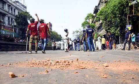 Police personnel at the site where a clash broke out between BJP and TMC workers in Girish Park area, in Kolkata on Saturday. 