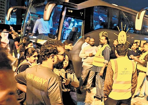 A photo from a returnee shows people who had booked seats on the first chartered flight of Gulf Air being transported to Dammam in buses from Manama in Bahrain.