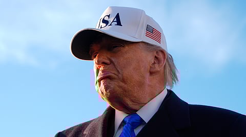 US President Donald Trump speaks to reporters before he boards Air Force One, Friday, March 13, 2026, at Joint Base Andrews, Md., for a trip to Florida.
