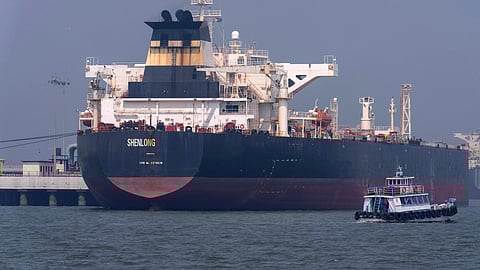 The Liberia-flagged tanker Shenlong Suezmax, carrying crude oil from Saudi Arabia, that arrived clearing the Strait of Hormuz, is seen at the Mumbai Port in Mumbai, India, Thursday, March 12, 2026.