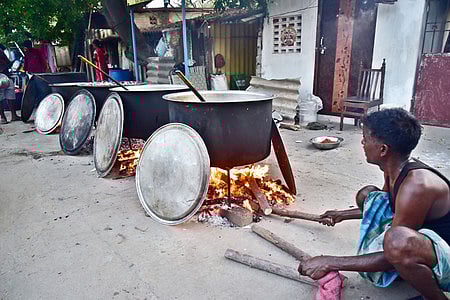 Caterers cooking food using firewood on the roadside following LPG crisis, at Villivakkam in Chennai on Sunday, March 15, 2026.

(File Photo |P Jawahar, Express) 